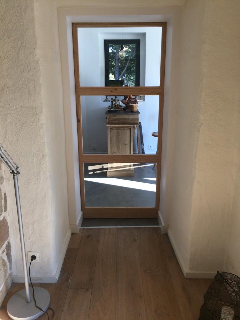 Porte à galandage en verre